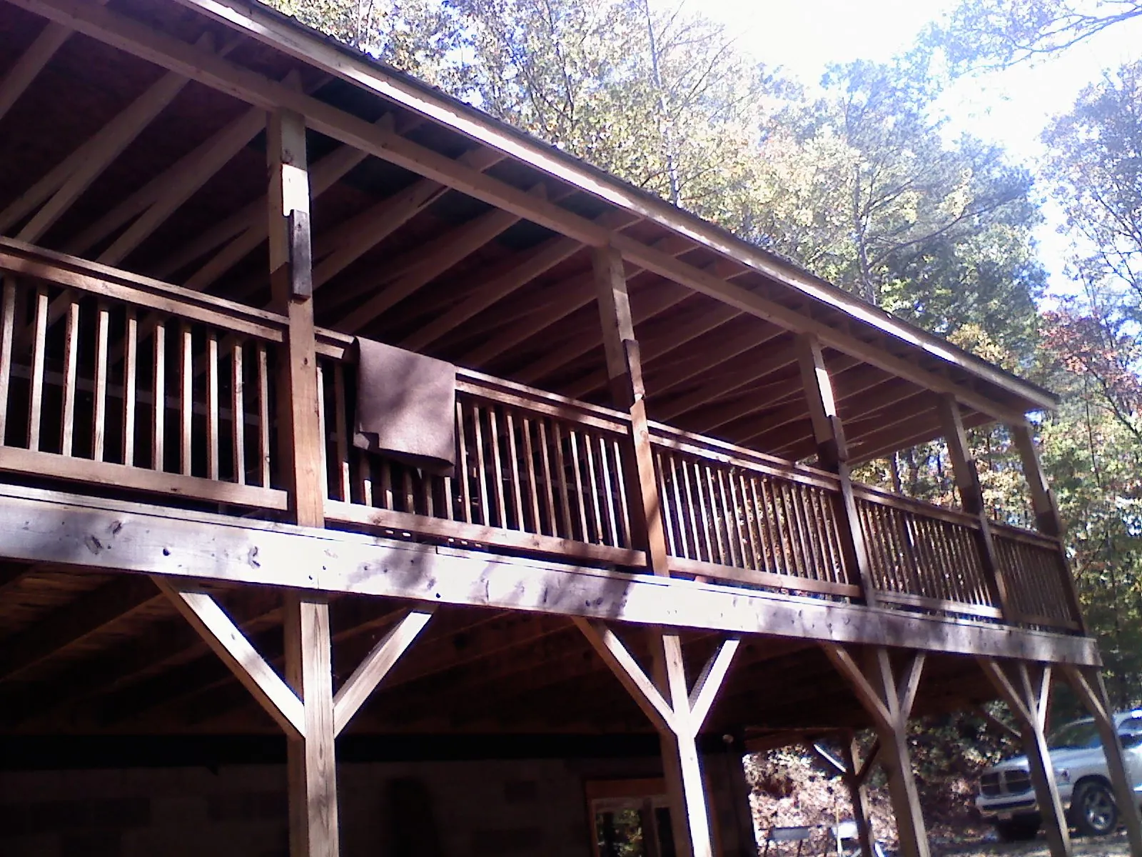 Timber framing under a new elevated porch and deck — Roof Leak Repair in Roggen by Roofing Brothers